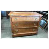 CARVED OAK DRESSER ON WHEELS