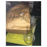 Glass Globes brass candle sticks and brass bowl Glass Globes brass candle sticks and brass bowl