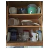 Tupperware and Pyrex measuring cup