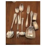 Monogramed silverware and napkin holders Monogramed silverware and napkin holders