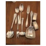 Monogramed silverware and napkin holders