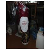 Santa Claus wooden log statue