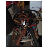 Garden tools, shears, tire iron, jumper cables Garden tools, shears, tire iron, jumper cables
