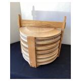12 wood chargers in carrier, 12 1/2' diameter