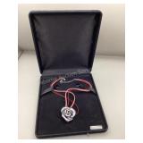 Sterling Rose Pendant on leather strands