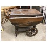 Wood tea cart, needs polishing, stored in garage