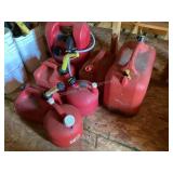 7 gas cans, some have liquid