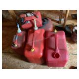 4 gas cans & metal boat gas can