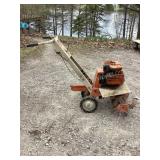 Montgomery Ward 5HP rototiller, rolls over
