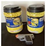 Colt 25 air soft & 2 containers of BBs