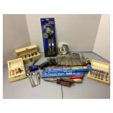 Forster bits, punch set, tubing bender, hacksaw