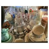Tabletop of vintage glass, knick knacks, dishes,