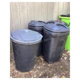 3 empty trash cans