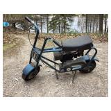 Vintage Montgomery Ward mini bike, rolls over