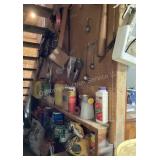 Wall of gardening supplies, yard waste bags,
