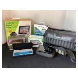 Garmins, digital photo frame, Tracfone & more