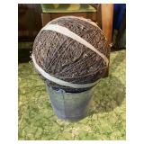 Large ball of string from railroad & bucket