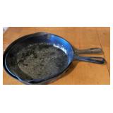 2 cast iron fry pans; one Griswold