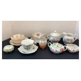 Teacups, creamer & sugars and more