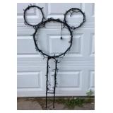 Mickey Mouse shaped yard ornament. 55"t x 30.5"w,