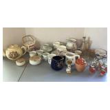 Teapots, tea cups, strawberry cups, shot