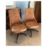 2 MCM swivel dining chairs