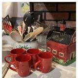Cookie jar, utensils, glass pitchers & red mugs
