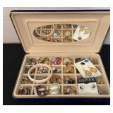Jewelry box filled with earrings, pins & more