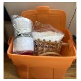 Tote with new rolls of fleece, thread holder,