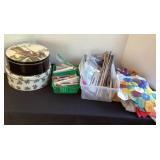 Tins of buttons, bric brac, knitting needles,