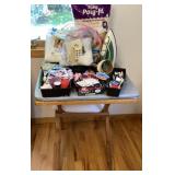 Folding table, ironing board top, iron, thread,