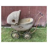 Antique wicker baby buggy