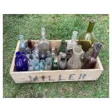 Crate of vintage bottles & insulators