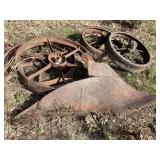 4 iron wheels & plow moll board piece