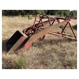 Front trip loader bucket