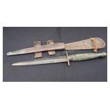 11 1/2' fighting knife with leather sheath,