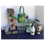 Watering cans, bird house decor, sunflower hook &