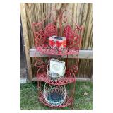 Red metal corner stand & contents, 17' wide x 4
