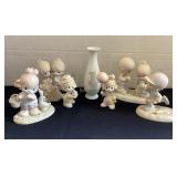 7 Precious Moments Figurines