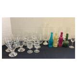 Pewter bud vase, colored bottles & stemware