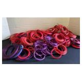 Colorful reed material for baskets; pink &