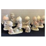 7 Precious Moments Figurines