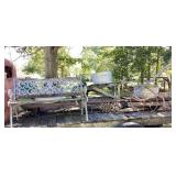 Yard art & scrap metal on top of truck bed