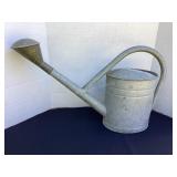 Galvanized watering can, 28' wide x 17 1/2' tall