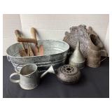 Bin of old garden tools, cast flower frog,