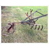 Antique cultivator, 74' long
