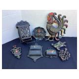 Cast iron trivets, rooster & match holders,