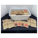 Tote of burlap gift bags, some Christmas