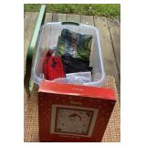 Storage tote of linens, mittens & Santa tray