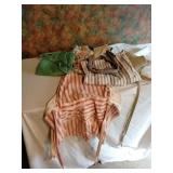 Aprons and cream table cloth